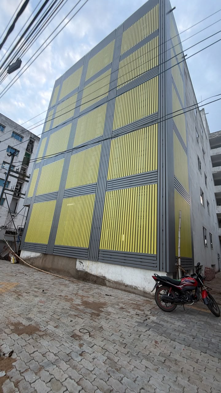 Hunter Douglas 84R Facade System — premium architectural facade execution.